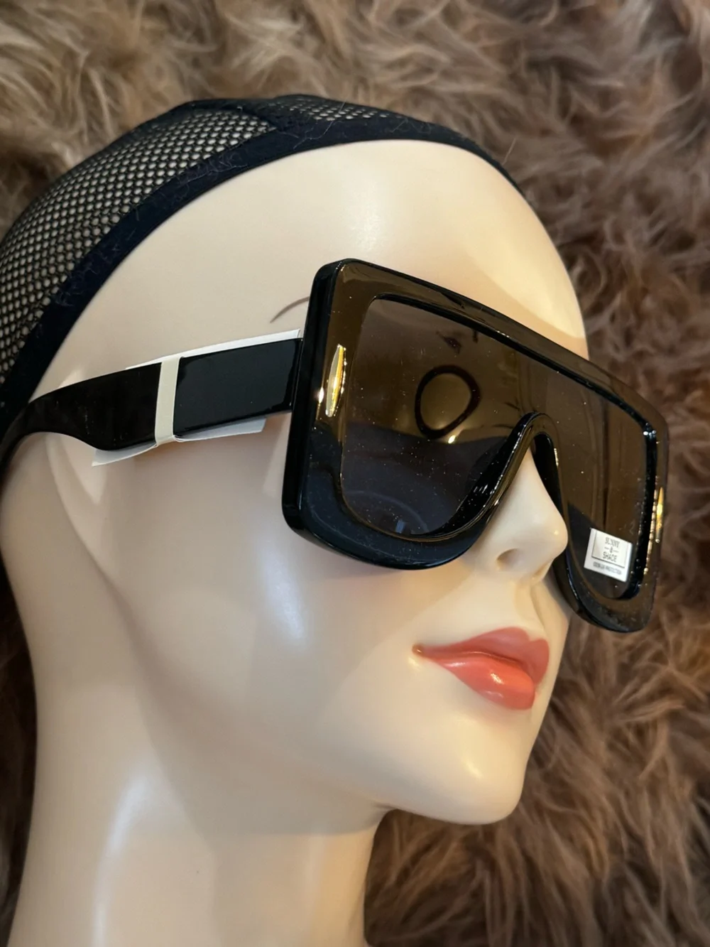 Futuristic sunglasses with gold details
